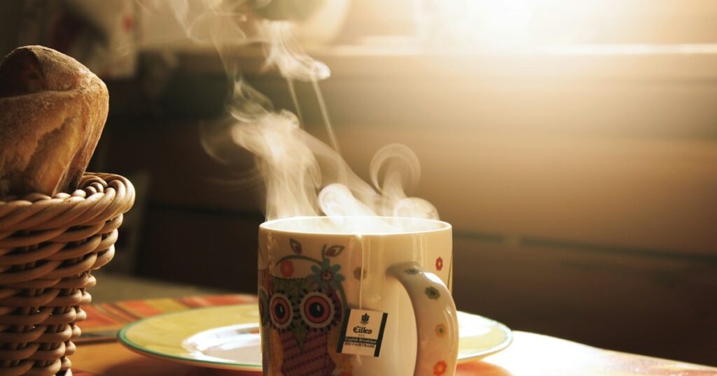 How to Design a Dedicated Morning Coffee and Mindfulness Nook at Home green and white mug