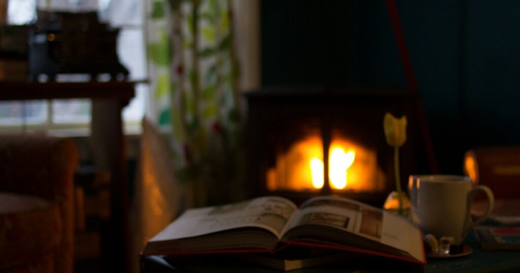 Building a Calming Evening Routine for Restful Sleep and Mental Clarity white book near mug